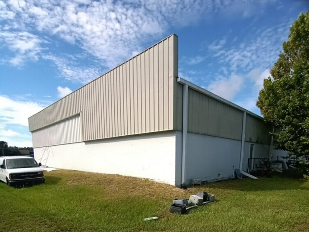 Commercial storefront being pressure washed